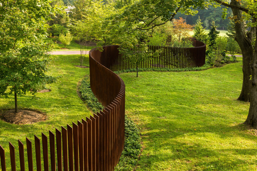 sculptural fence made of cor-ten steel