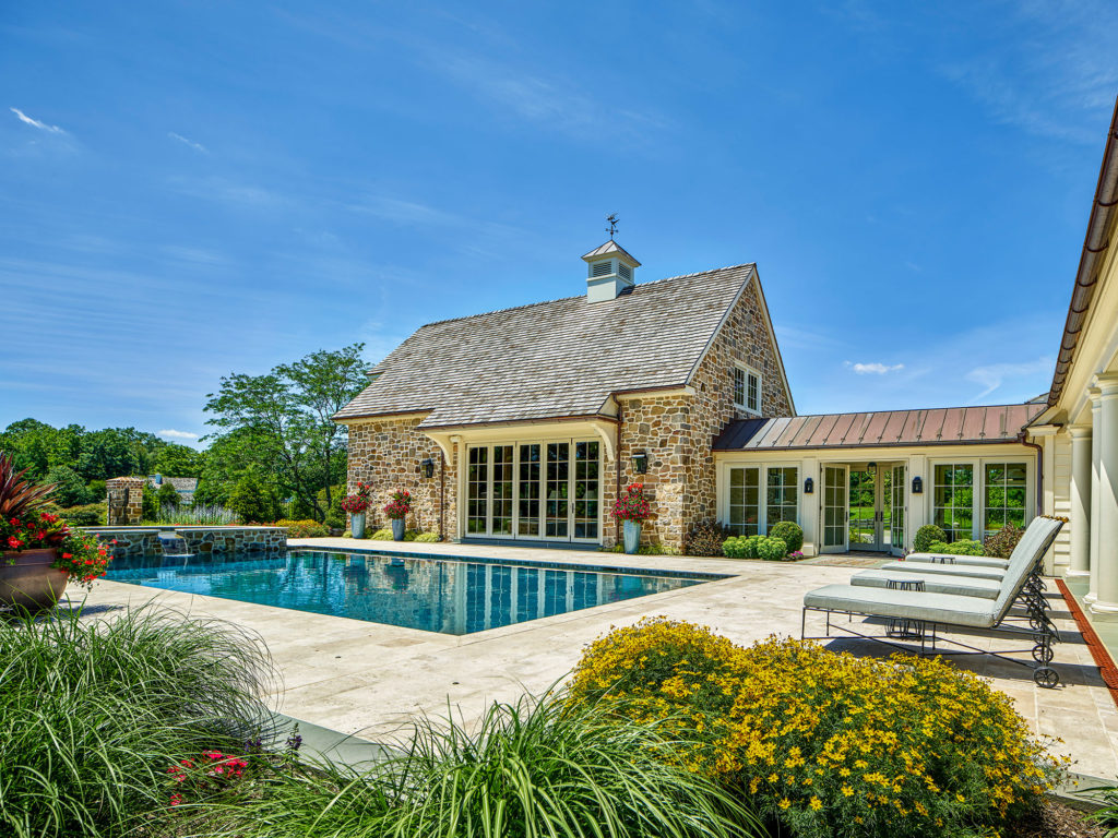 swimming pool, patio and pool house in outdoor space design