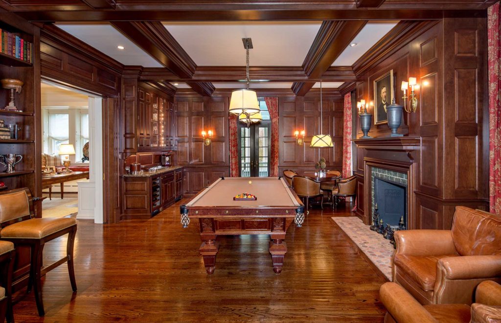 wood paneled billiards room