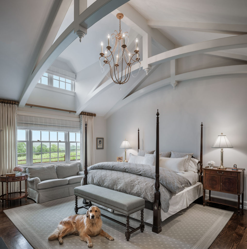 pale gray master bedroom with vaulted ceiling