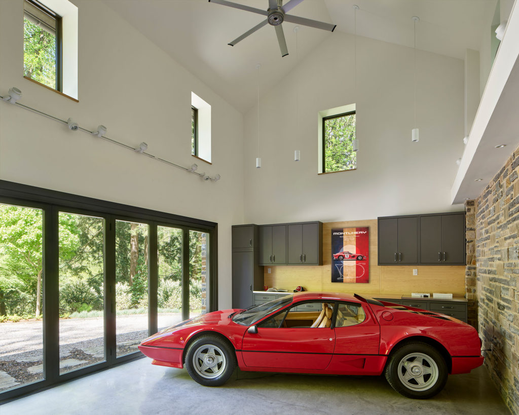 vintage car garage with closed telescoping glass doors