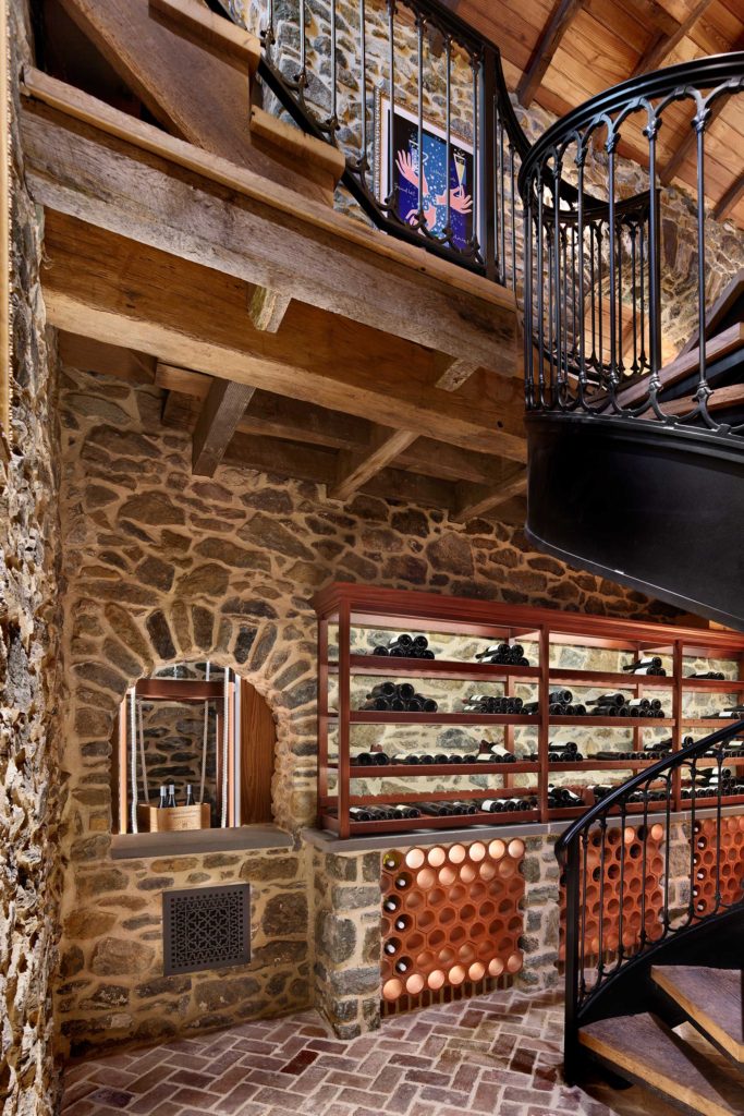 dumbwaiter and racking system in wine cellar