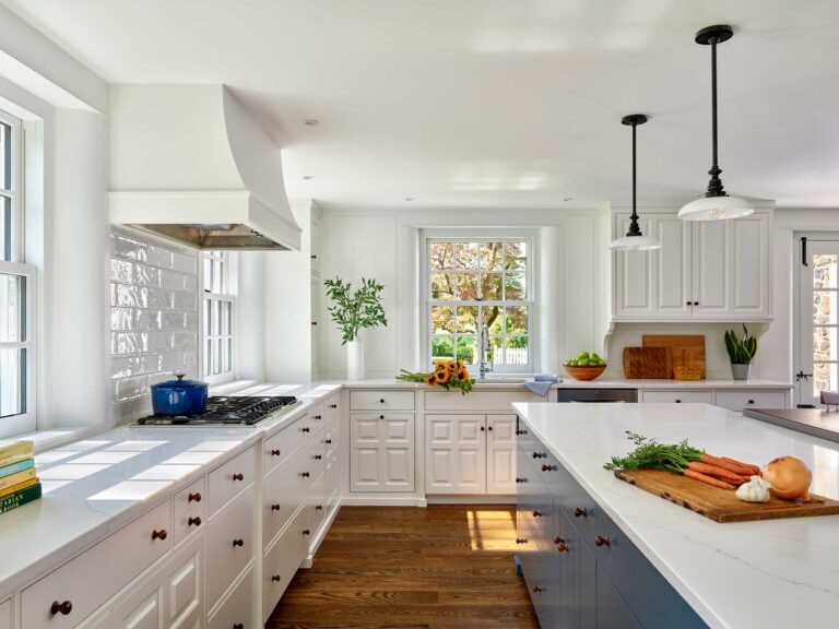 bright and airy blue and white kitchen designed as part of the addition to Dower House