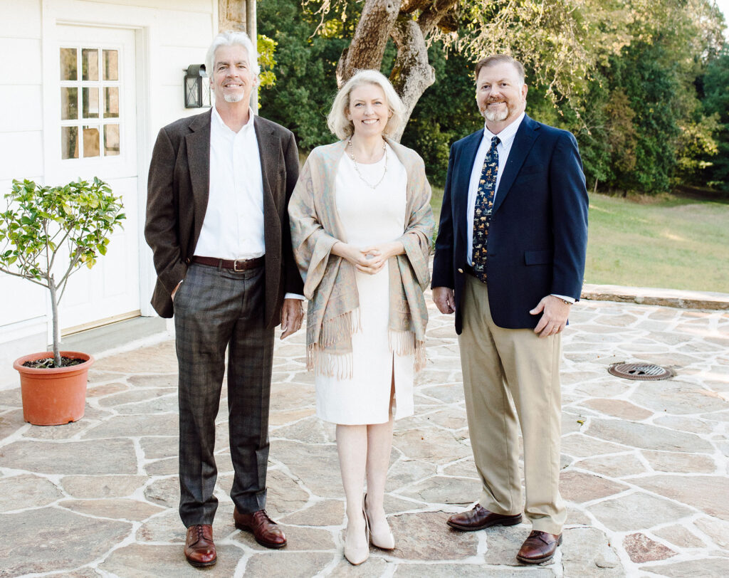 Founding partners Peter Archer at left and Richard Buchanan at right with Archer & Buchanan firm partner Michele Thackrah at center