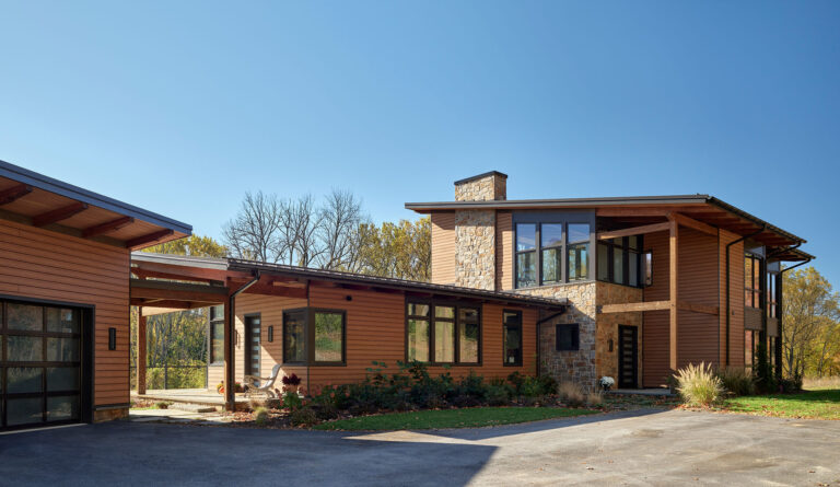 elevation showing family entry, formal entry and garage of Bough Haus