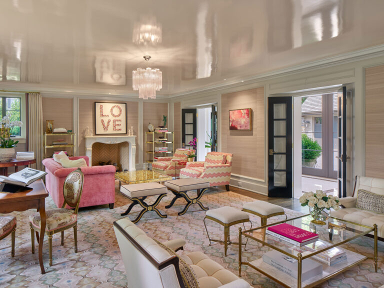 living room done in shades of pink with a high gloss plaster ceiling and french doors connecting to a loggia