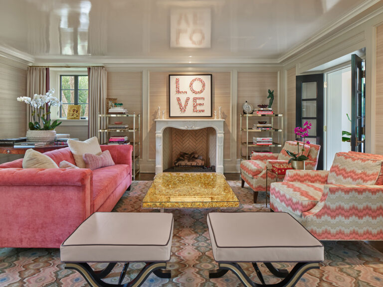 living room done in shades of pink in renovation of 1950s colonial revival home in Greenville, Delaware